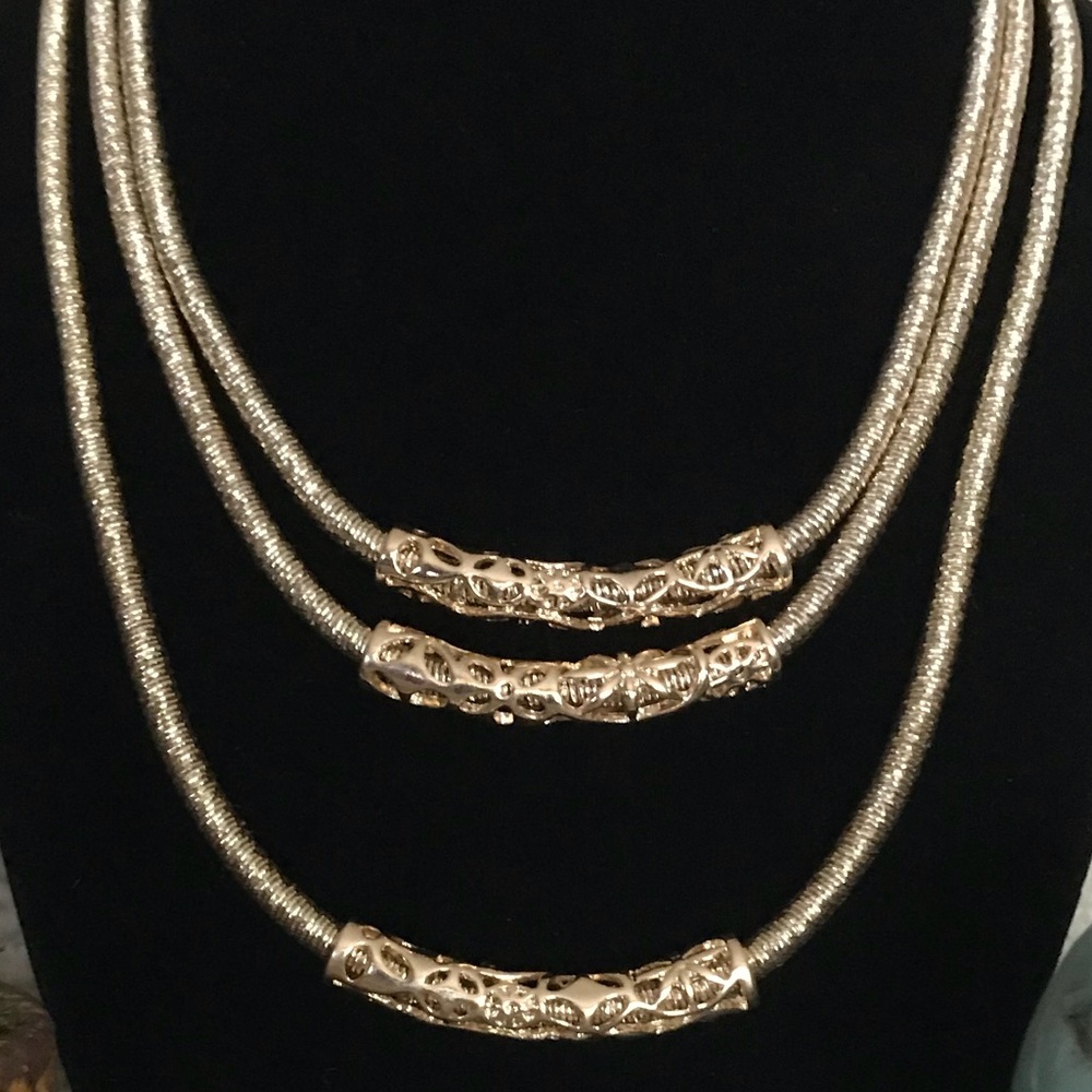 Brand new Gold Curved Necklace